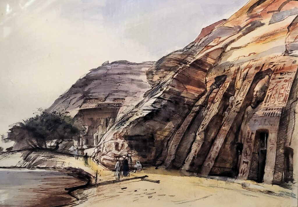 The facade of the temples of Abu Simbel taken from in front of the Small Temple, with the Great Temple in the background.